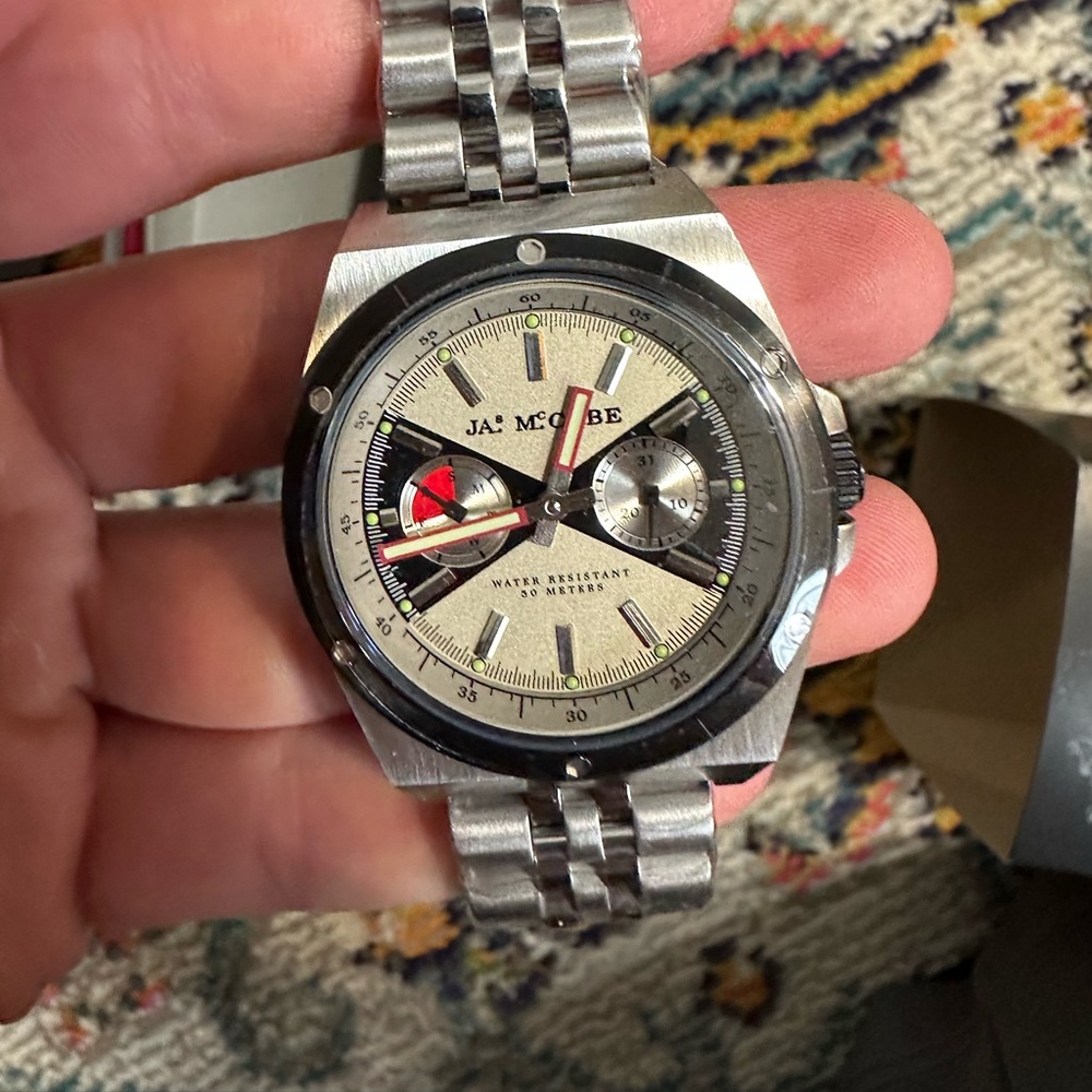 James McCabe watch stainless steel watch with black bezel